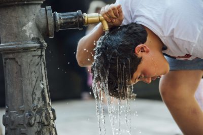 water over the head as personal climate control