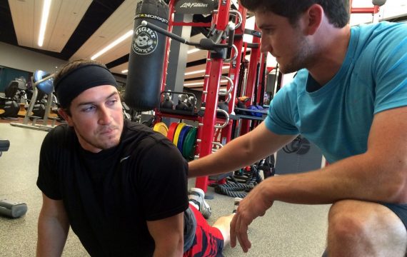 an eSports gamer is trained in a gym